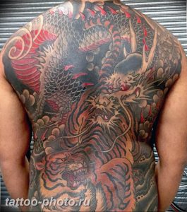 фото тату тигр и дракон 07.12.2018 №075 - tattoo tiger and dragon - tattoo-photo.ru